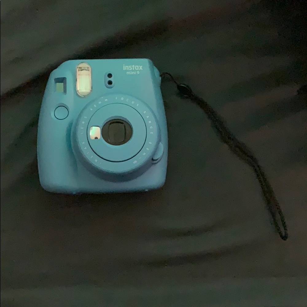Blue Polaroid camera